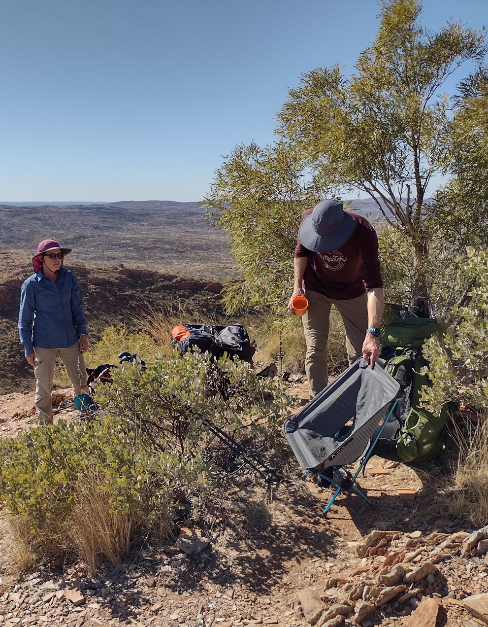 Phil trying to find some shade for his Helinox.